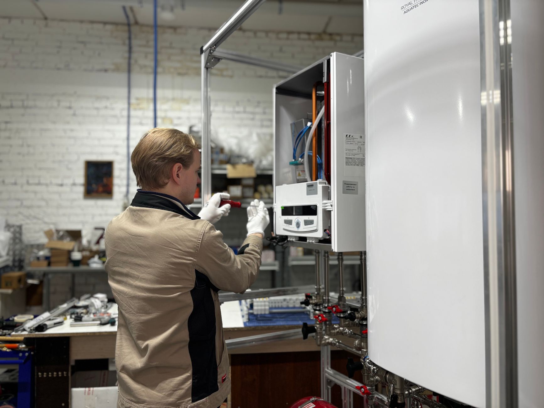 Technician inspecting a heating and cooling system